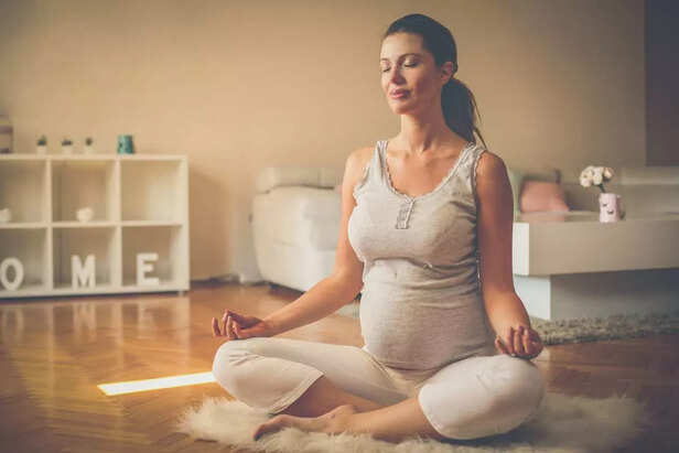 pregnant woman meditating